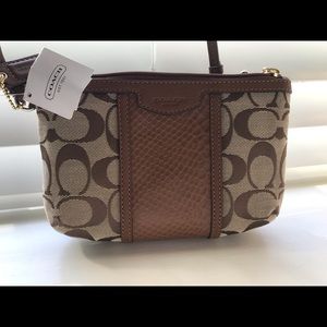 Coach signature print wristlet